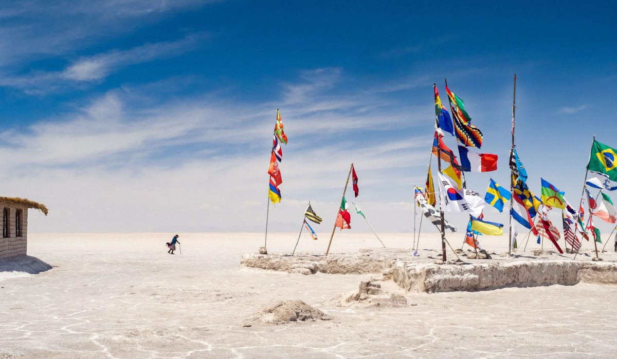 Colorful flags from all over the world at Uyuni salt flats in Bolivia, South America